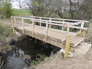The bridge over the Cut back in position over the gabions
