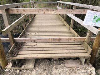 The end of the bridge over the Cut resting on the gabions